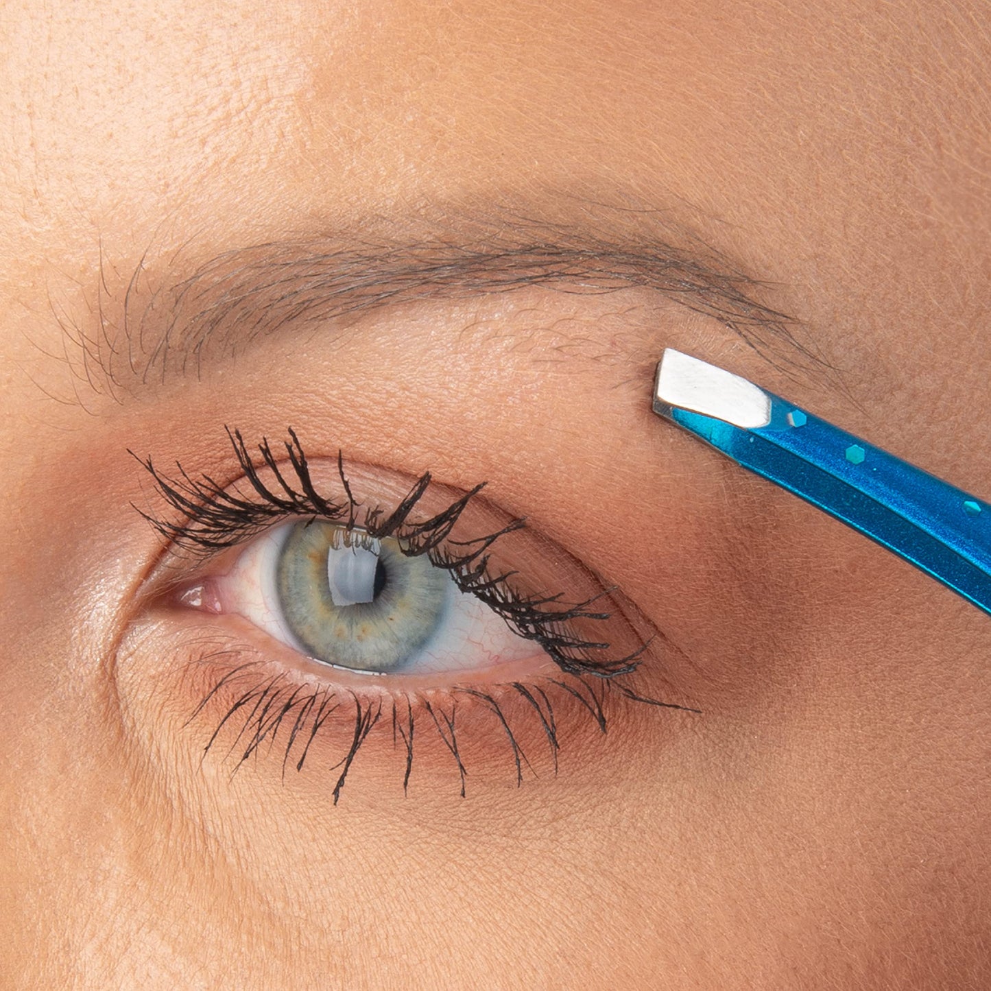 TRIM Azure Collection Slant Tip Tweezer - Precision-Ground Tips Grasp Even The Finest Hairs - Angled to Align with The Brow's Natural Arch - Calibrated Tension for More Control - Stainless Steel